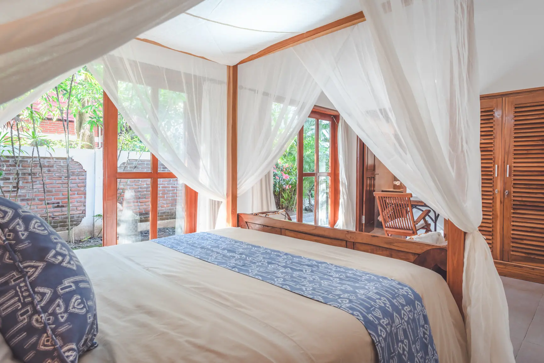 A bedroom at Primavera Beach House in the morning light